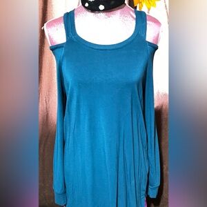 Reaction by Kenneth Cole cut out shoulders . Beautiful blue/turquoise